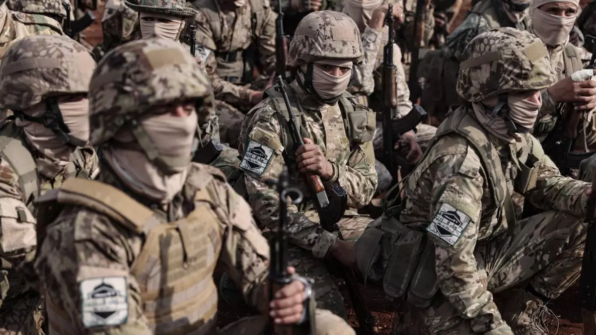 Luptători ai Hay'at Tahrir al-Sham Foto: Profimedia