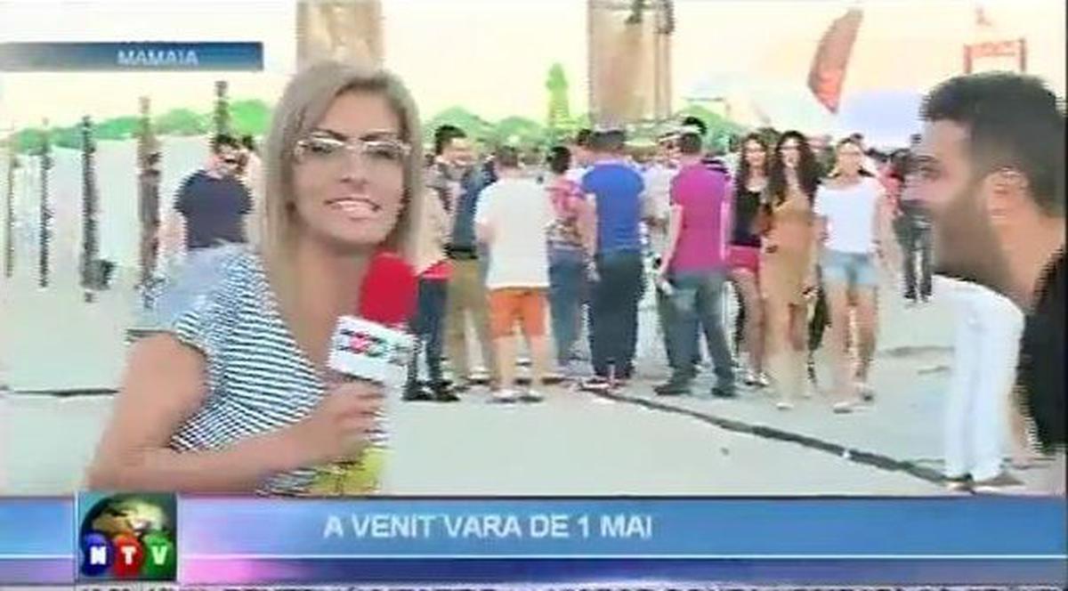 "Cocalarul de nisip" în acţiune. A văzut fata, a văzut camera video şi s-a năpustit pe jurnalistă în direct | VIDEO 