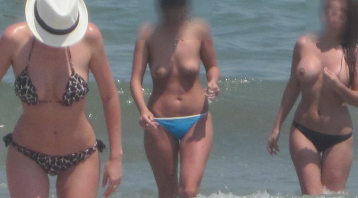EŞTI LA MARE? Uite ce bunăciuni stau FĂRĂ SUTIEN pe plajă! Poate una e chiar lângă tine!