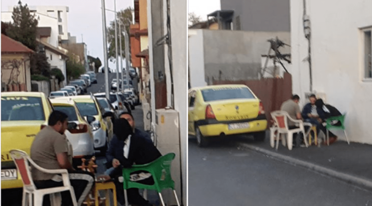 Imagini incredibile în Constanța. Partidă de cărți aproape de sediul poliției