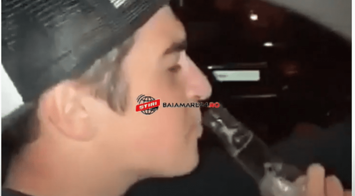 VIDEO| Inconștiență fără limite. Un tânăr din Baia Mare conduce în timp ce bea bere