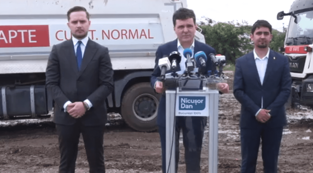 Nicușor Dan, o nouă conferință cu scandal. Bruiat de camioanele primăriei lui Daniel Florea