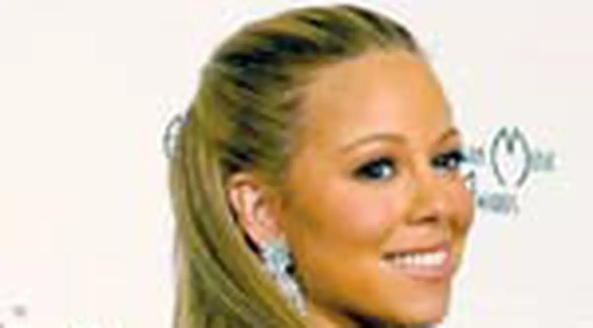 Mariah Carey merge la baie cu bodyguarzi
