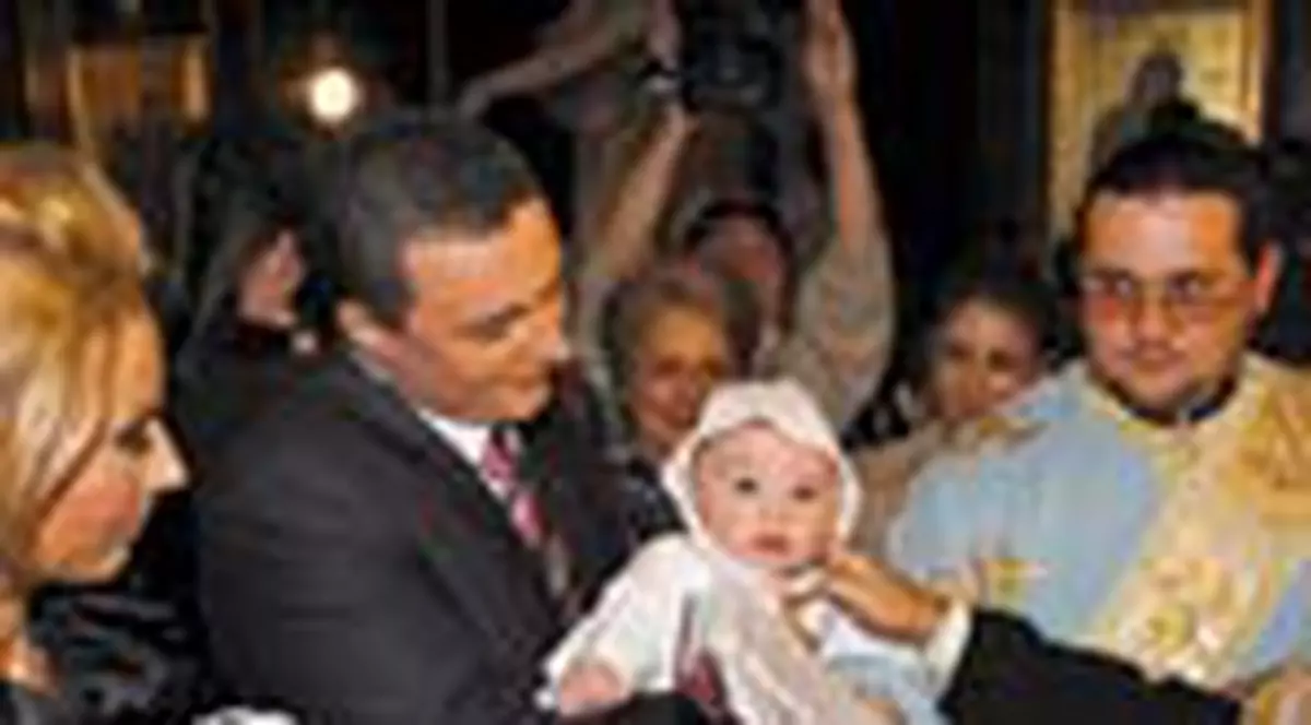 Au plans la botezul fiului lor