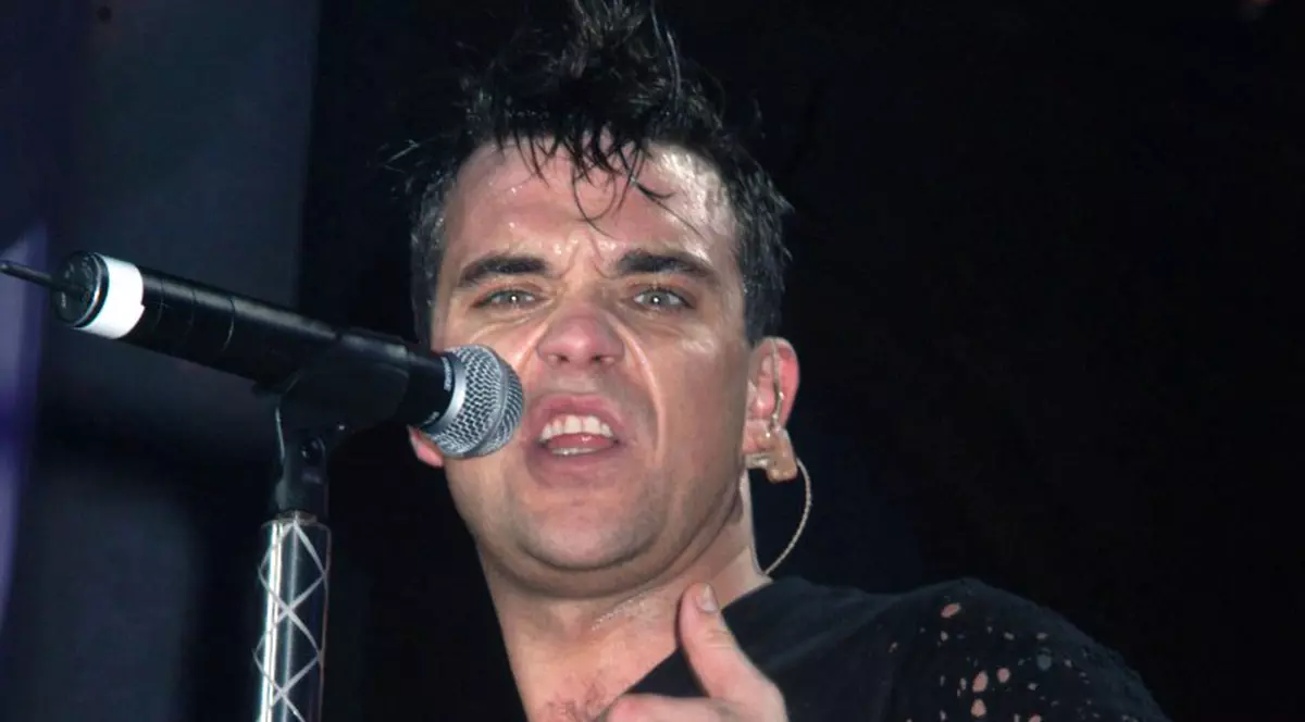 Robbie Williams cântă din nou cu Take That