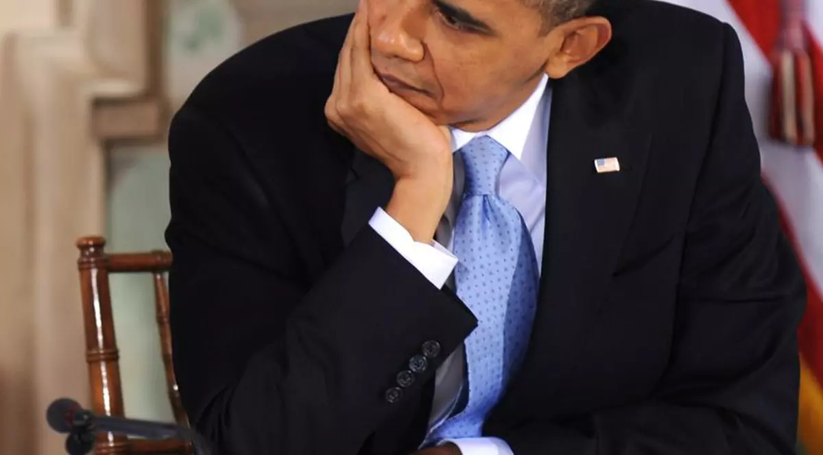 Barack Obama, obligat de doctori să se lase de fumat
