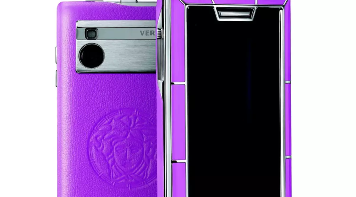 Telefon de fiţe, cu ramă de aur, de la Versace