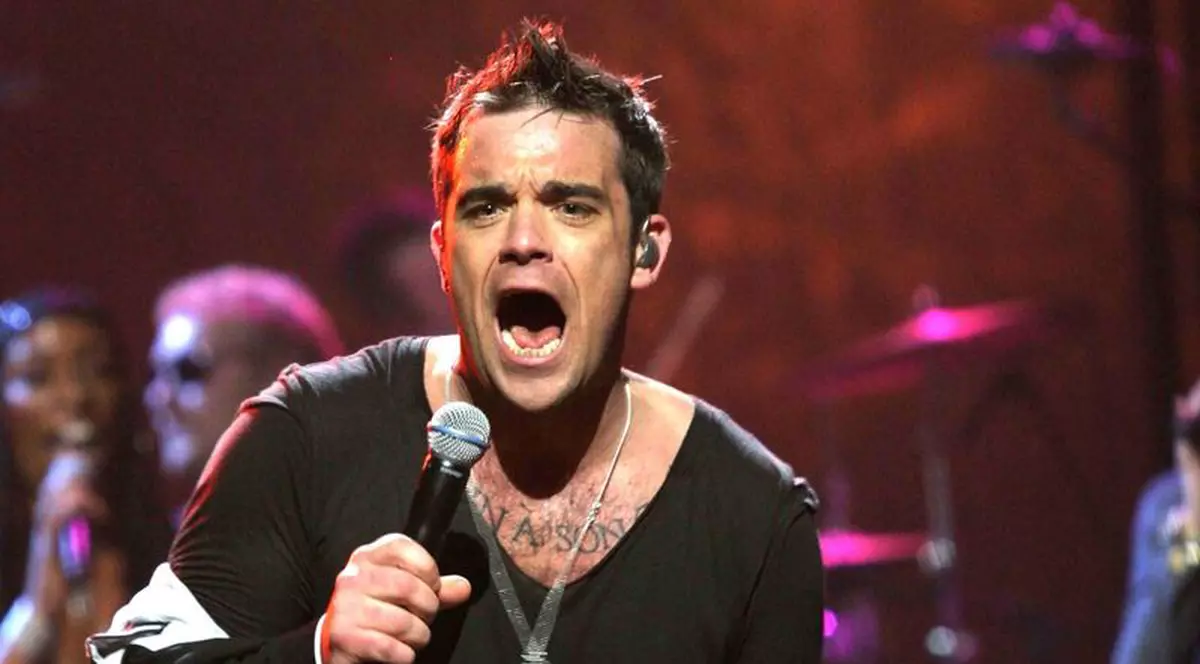 Robbie Williams se întoarce în studio alături de trupa care l-a făcut celebru!