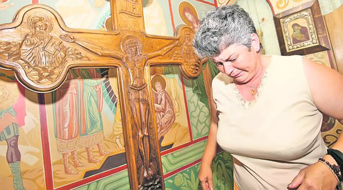 Halal dreptate! Mama tânărului împuşcat de "călăul de pe baltă", silită să-i dea bani ucigaşului fiului ei!