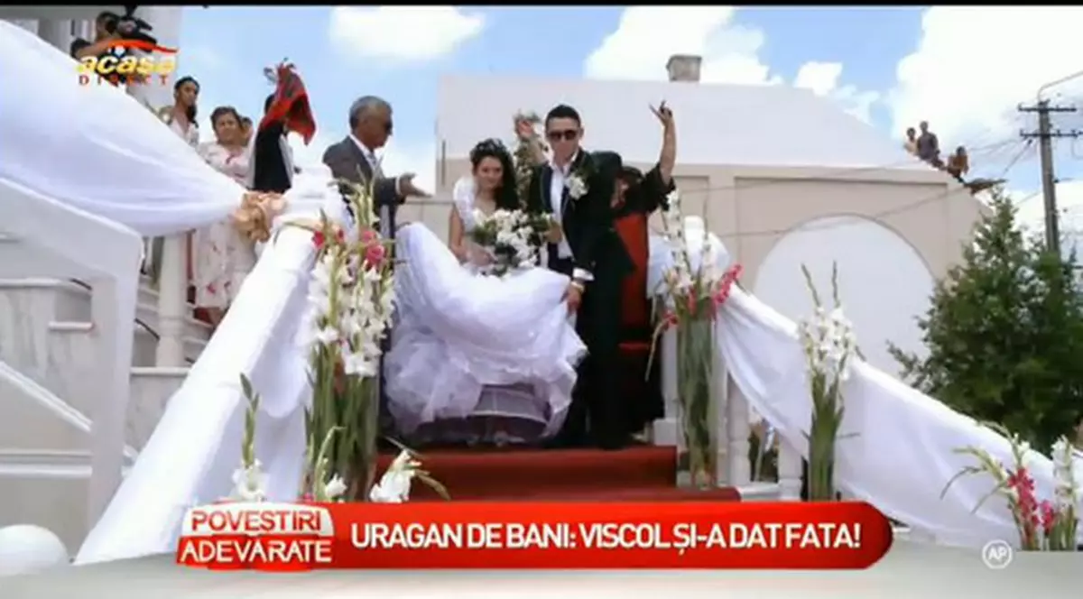 Nuntă cu mare fast în Lugoj unde bulibaşa si-a măritat nepoata! Mireasa a purtat o rochie de 35.000 de euro! FOTO