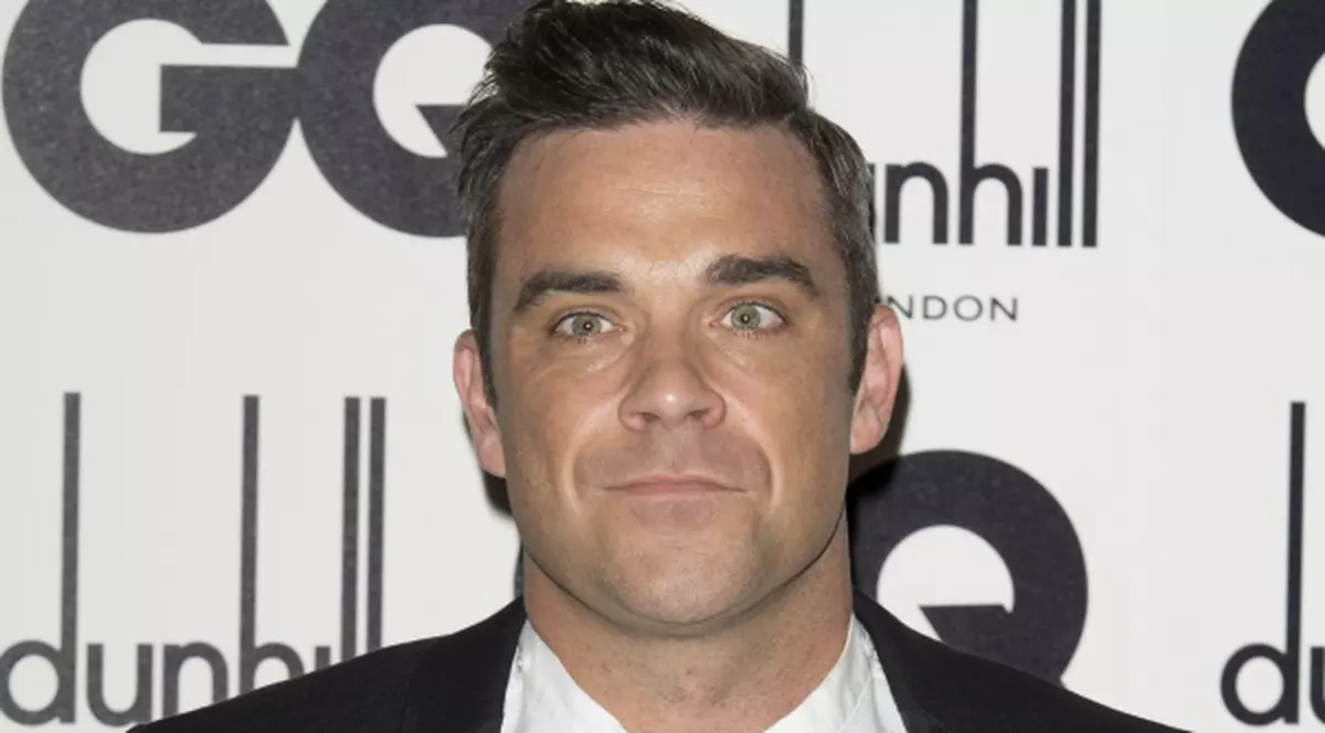 Robbie Williams le înnebuneşte pe femei! GESTUL IMPRESIONANT al solistului