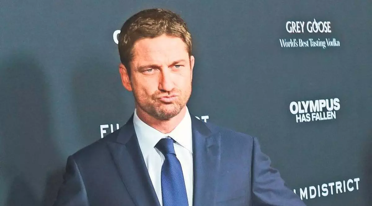 Gerard Butler, ziua şi femeia!