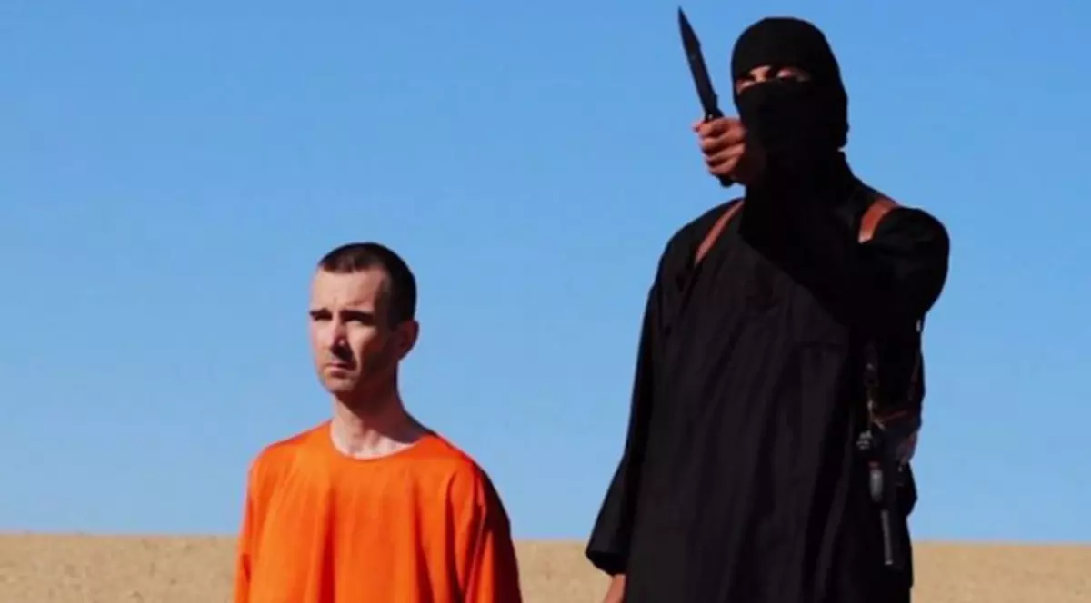 Statul Islamic a PUBLICAT IMAGINI cu DECAPITAREA  JURNALISTULUI britanic David Haines| VIDEO