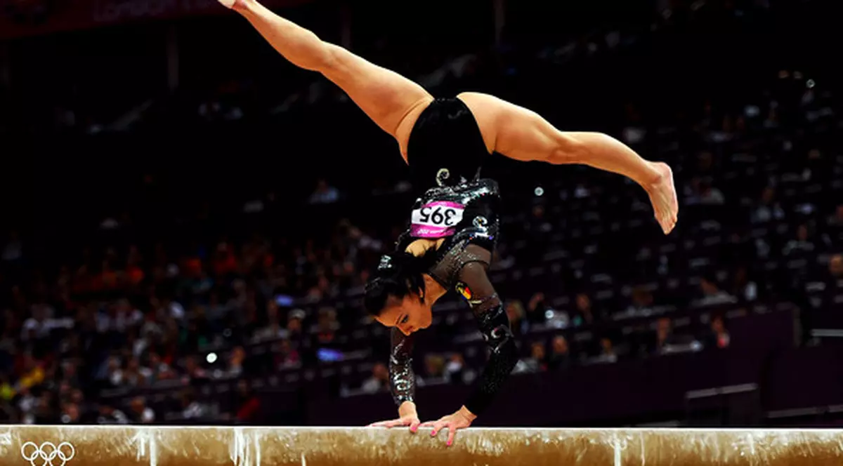 De vis! Cătălina Ponor, aur la bârnă, la prima competiție de la revenire. Diana Bulimar, argint la sol