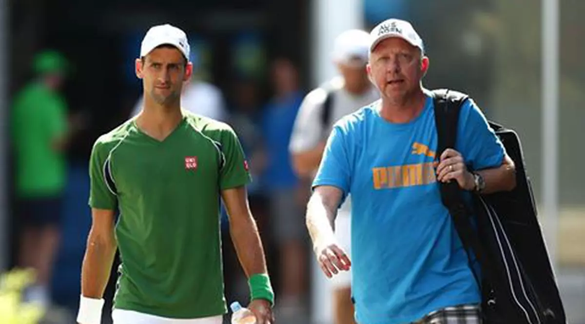 Novak Djokovici l-a concediat pe Boris Becker (dreapta)