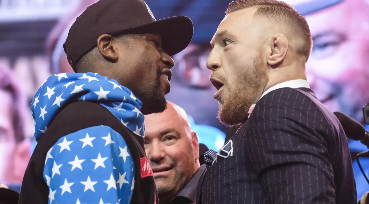 Floyd Mayweather (stânga) și Conor McGgregor, în timpul unei conferințe de presă. (FOTO: Northfoto)