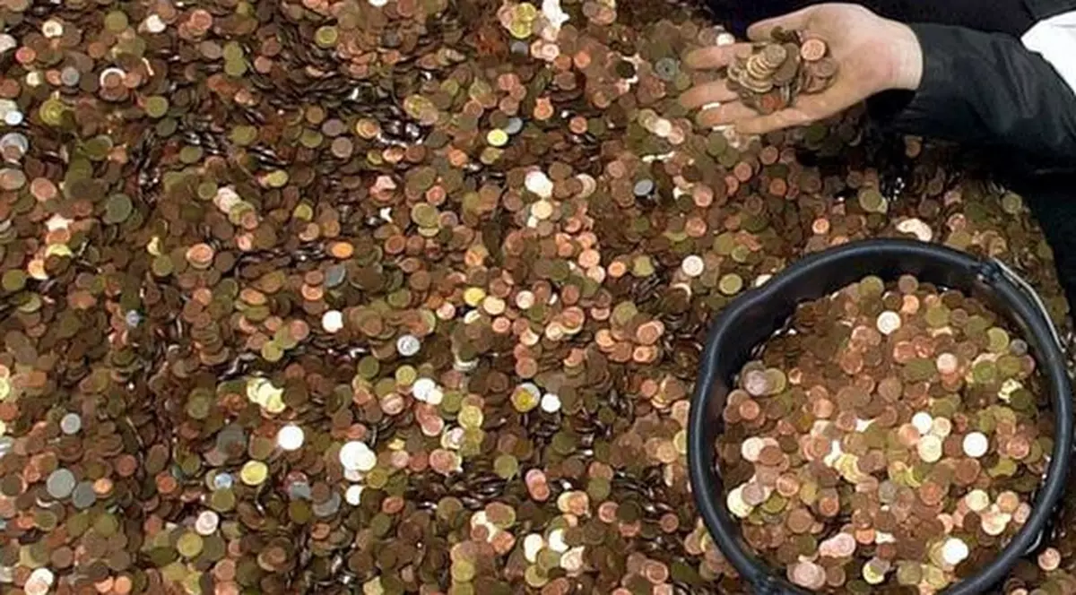 Un bancher german a fost nevoit să numere 2,5 tone de monede