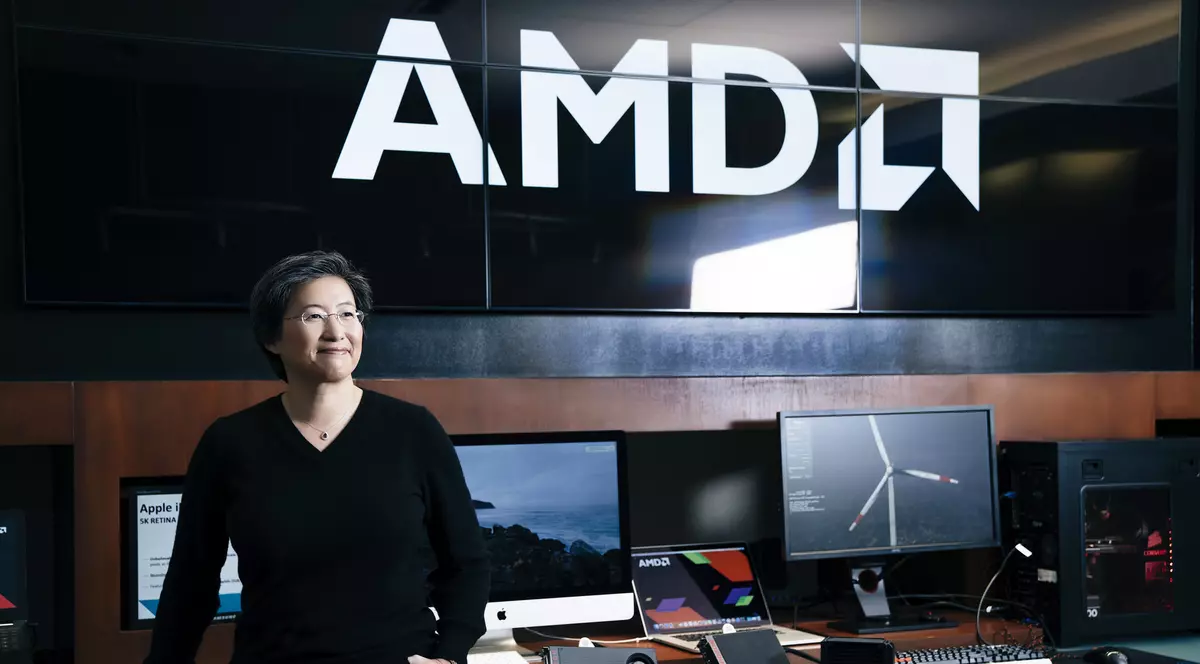 Procesoare Intel cu grafică AMD Radeon. Cele două companii au prezentat la CES 2018 cipuri Core i5 și i7 cu cipuri grafice AMD Radeon RX Vega M și 4 GB de memorie video. Lisa Su, șefa AMD, cu mai multe calculatoare și plăci video în spate