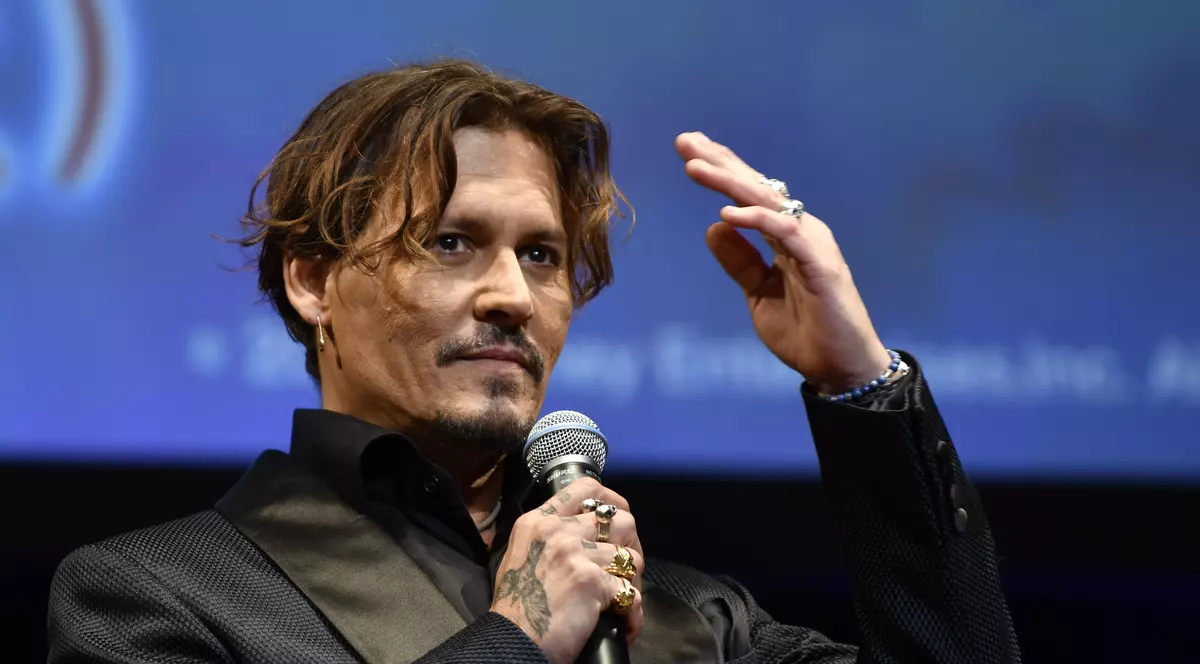 Johnny Depp a ajuns la o înţelegere cu foştii săi manageri
