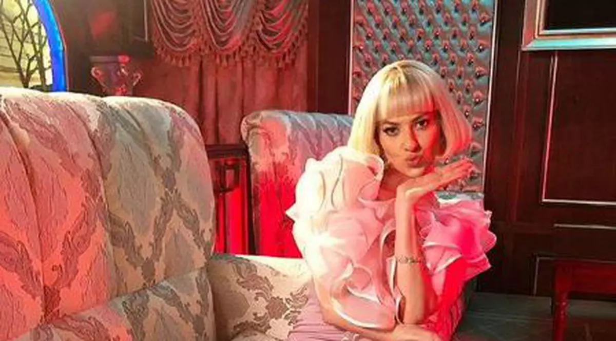 Imagine de colecție cu Lidia Buble și bunicul ei. Prietenii virtuali au reacționat imediat