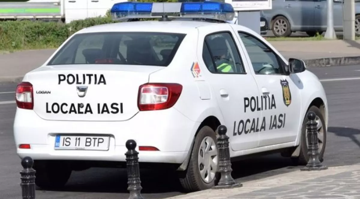 Polițist local din Iași, luat pe capotă de un șofer