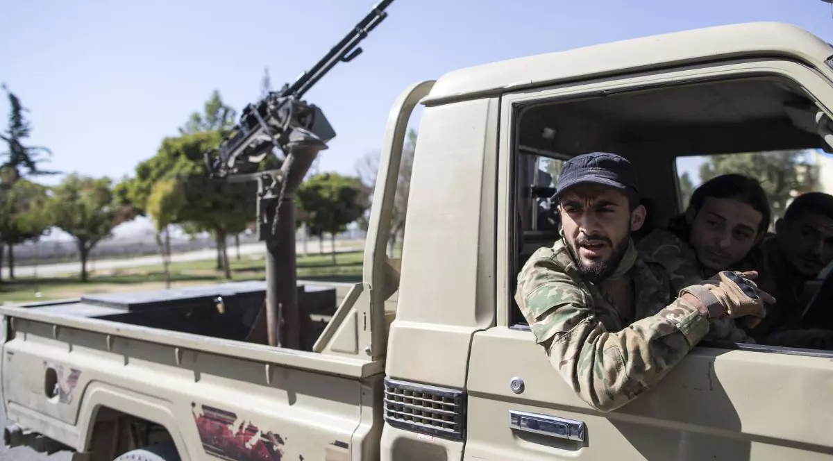 Imagini șocante cu luptători kurzi neînarmați uciși de aliații turcilor în operațiunea lansată de Erdogan în Siria