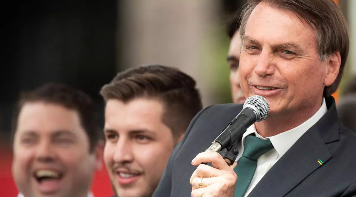 Președintele brazilian Jair Bolsonaro (dreapta), fotografiat în timp ce ia cuvântul / foto: EPA