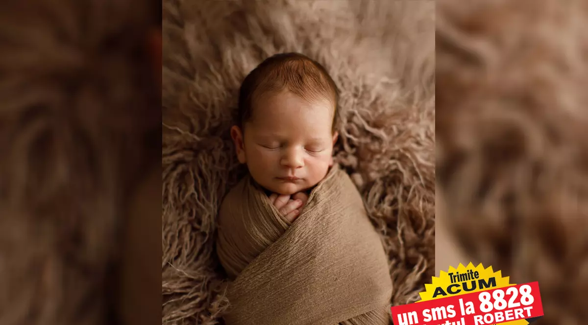 Viața micuțului Robert poate fi salvată cu un vaccin care costă 2.125.000 de dolari. În conturile bebelușului bolnav de amiotrofie spinală s-au strâns până acum aproape un milion de dolari