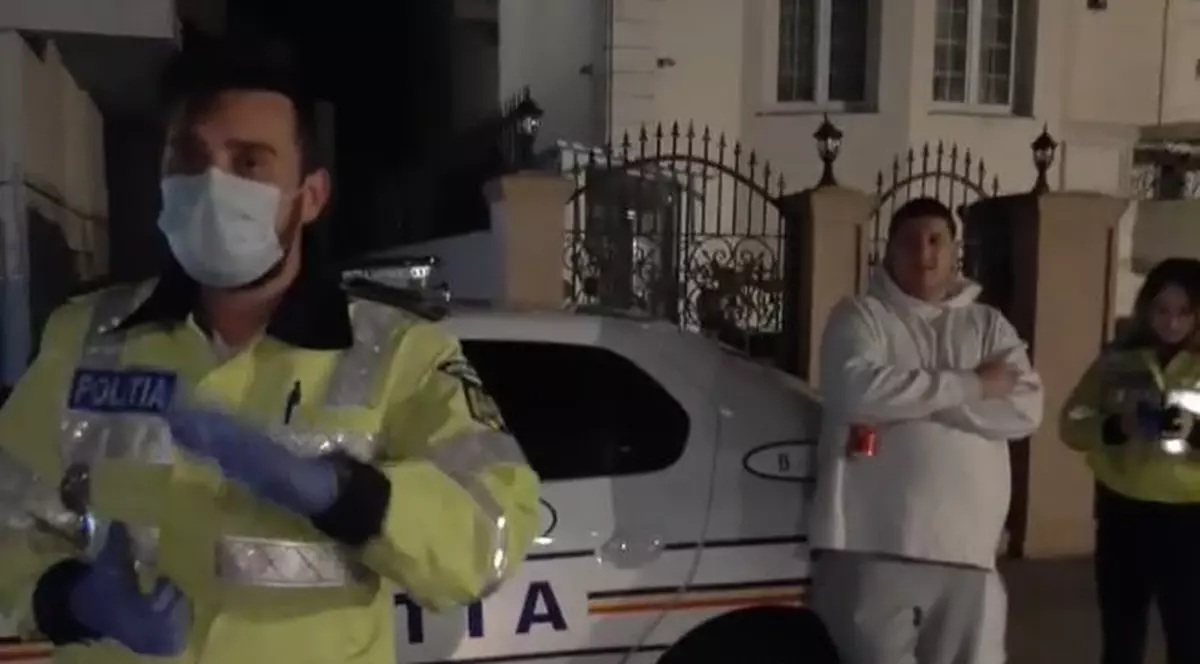 Ce spune băiatul lui Gabi Oprea după ce a fost filmat dând indicații polițiștilor, sprijinit de mașina lor﻿, într-un scandal cu o vecină pe locul de parcare
