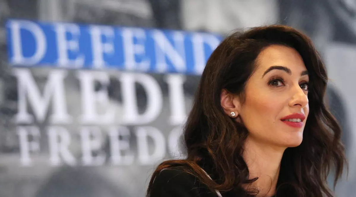 epa08248325 (FILE) - Lebanese-British barrister Amal Clooney delivers a statement to media in the margins of the G7 Foreign Ministers Meeting in Dinard, France, 05 April 2019 (re-issued 26 February 2020). According to media reports, the Maldives has hired Clooney to represent it at the International Court of Justice (ICJ) in support of the Rohingya minority. The Maldives' Minister of Foreign Affairs Abdulla Shahid on 25 February announced that the country will formally join The Gambia in challenging Myanmar's military crackdown on the persecuted Muslim minority. EPA-EFE/THIBAULT VANDERMERSCH