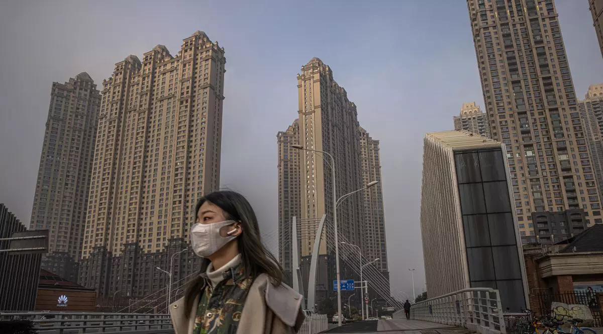 Familiile victimelor de COVID din Wuhan spun că oficialii chinezi le reduc la tăcere, în timpul vizitei anchetatorilor OMS în oraș