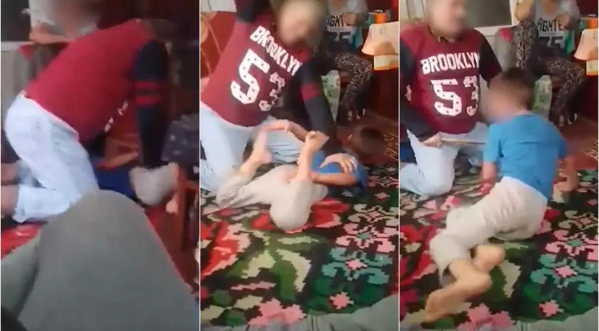 VIDEO | Imagini șocante cu un tată care își bate cu sălbăticie fiul de 7 ani. Individul a fost reținut