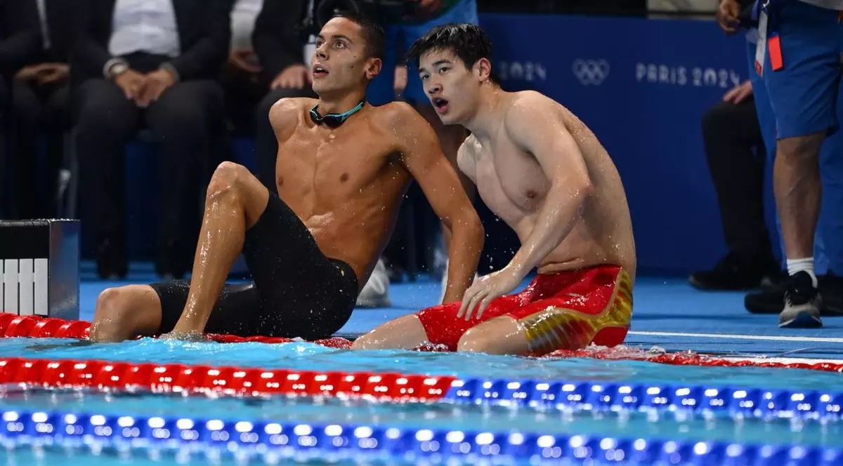 David Popovici alături de campionul olimpic Pan Zhanle. Foto: Raed Krishan – Gazeta Sporturilor