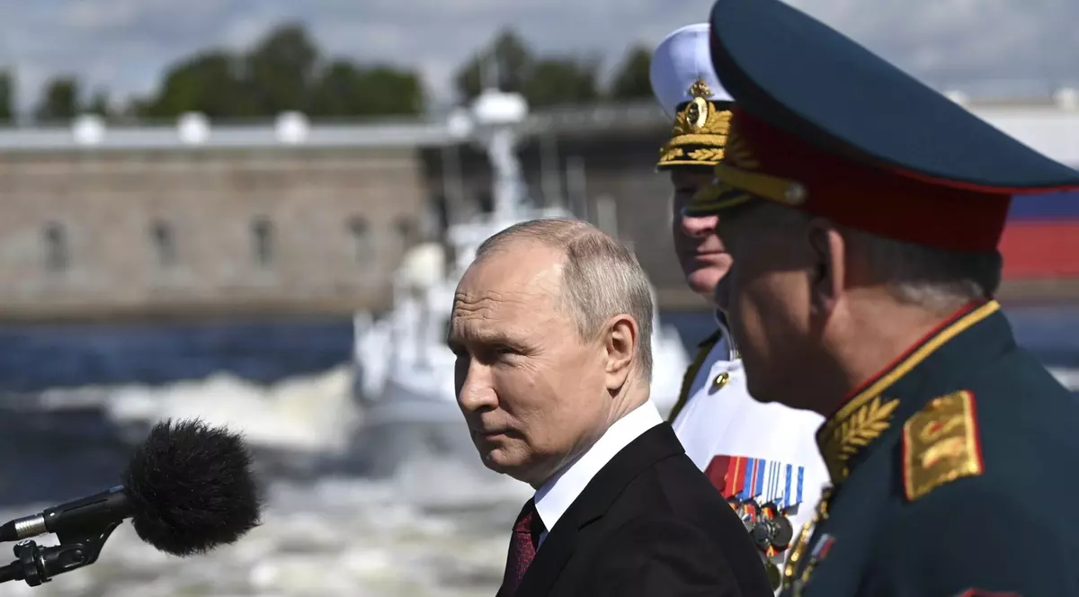 July 30, 2023, St Petersburg, Leningrad Oblast, Russia: Russian President Vladimir Putin, left, reviews the parade of naval vessels accompanied by Russian Defence Minister Sergei Shoigu, right, and Naval Commander Nikolai Yevmenov, center, onboard the naval cutter Raptor on the Neva River, July 30, 2023 in St. Petersburg, Russia. (Credit Image: © Alexander Kazakov/Kremlin Pool/Planet Pix via ZUMA Press Wire)
