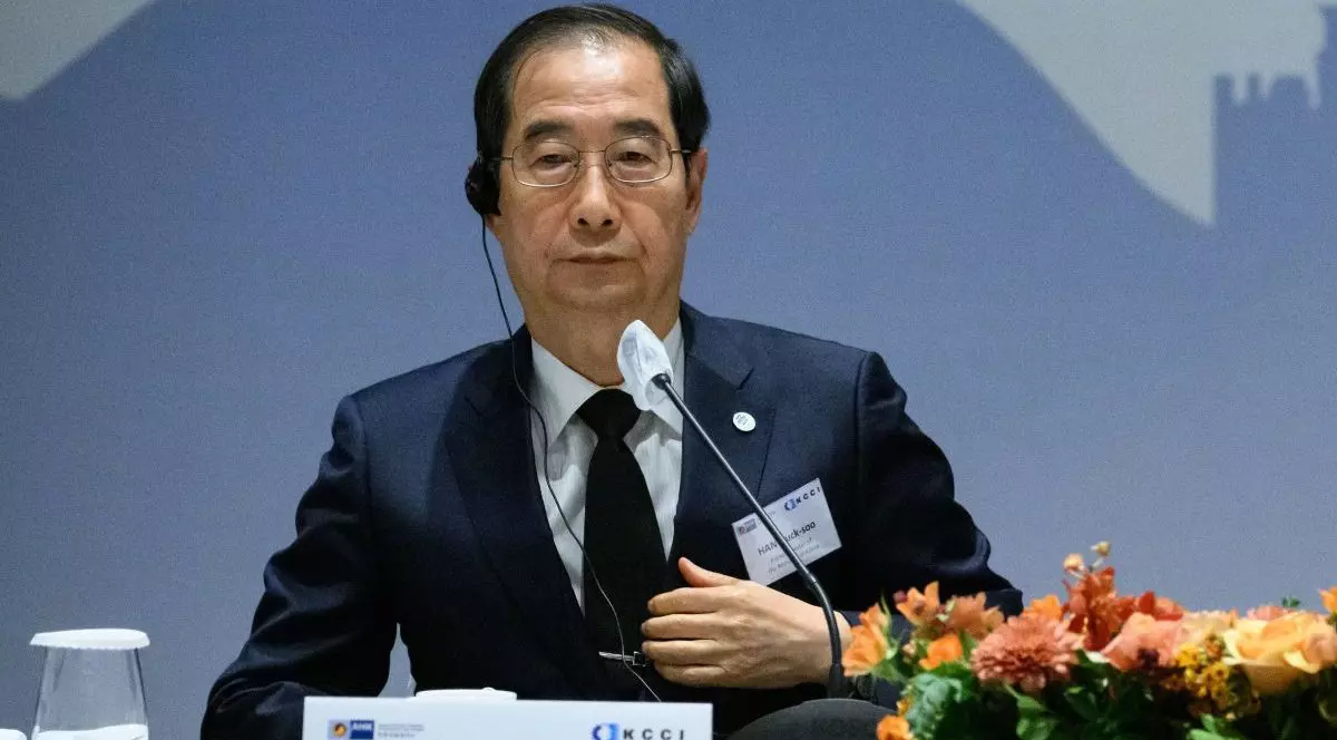 Han Duck-soo, în cadrul unei conferințe de presă