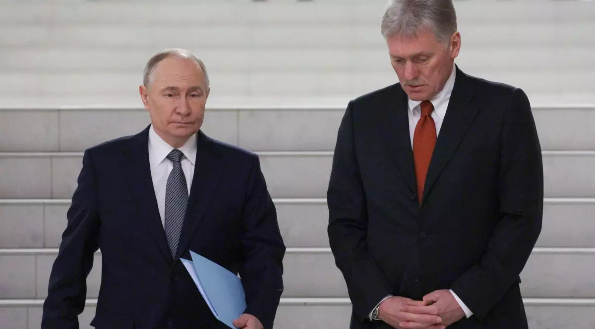 Dmitri Peskov și Vladimir Putin