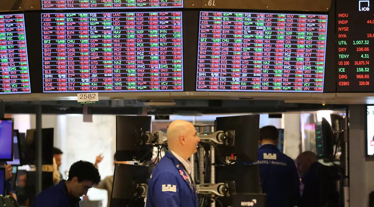 Traders work on the floor of the New York Stock Exchange in New York, the United States, on December 12, 2024. U.S. stocks ended lower on Thursday, as a hotter-than-expected producer price index (PPI) report overshadowed earlier momentum in tech shares. The Dow Jones Industrial Average fell 234.44 points, or 0.53 percent, to 43,914.12. The S&P 500 sank 32.94 points, or 0.54 percent, to 6,051.25. The Nasdaq Composite Index shed 132.05 points, or 0.66 percent, to 19,902.84. Photo by Liu Yanan/Xinhua/ABACAPRESS.COM