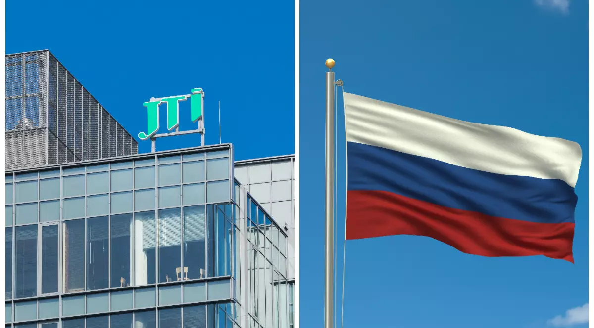În imagine este ilustrată o clădire cu literele de culoare verde JTI (Japan Tobacco International), iar în partea dreaptă este steagul Rusiei