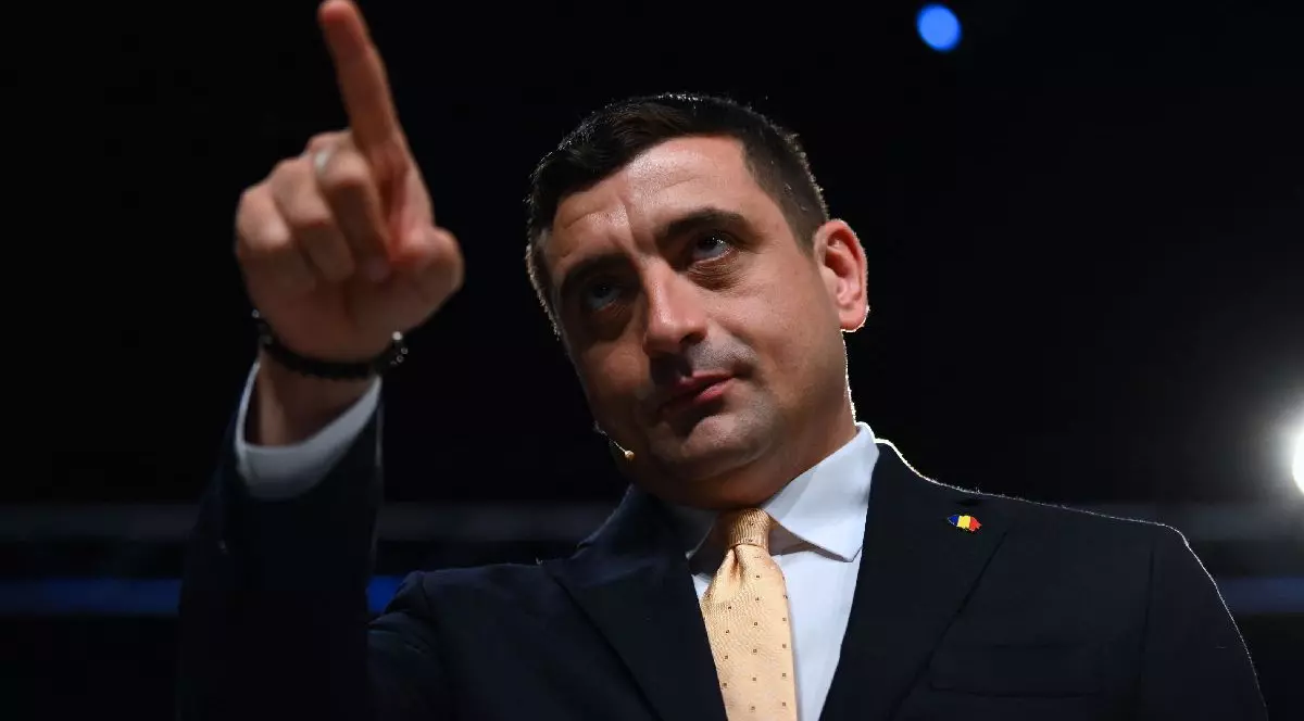 George Simion ujjal mutogat egy vita során. Foto: Hepta