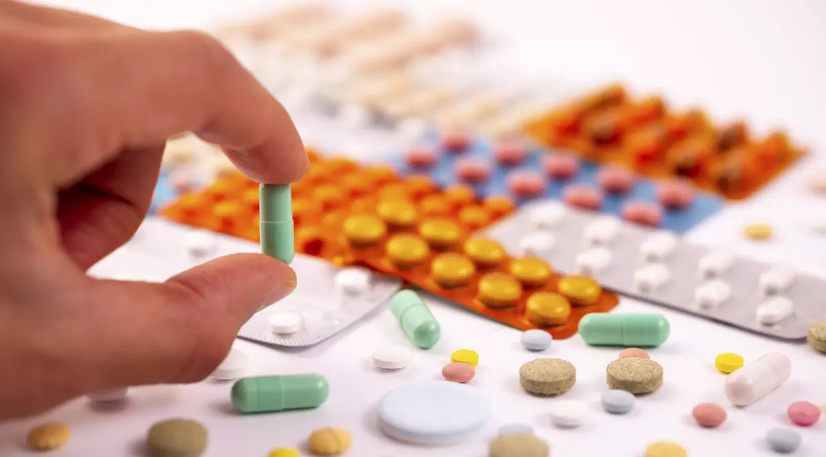 suplimente alimentare de culoare verde, portocaliu și alb