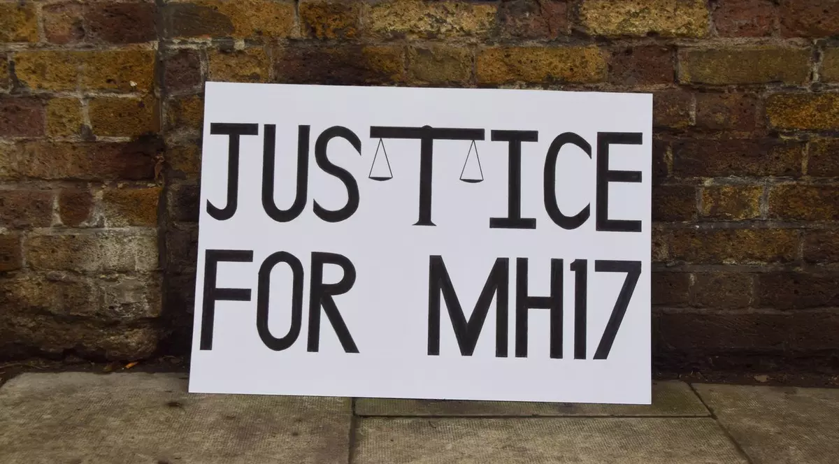 Un banner în care se cere justiție pentru doborârea zborului MH17. Imagine cu caracter ilustrativ Foto: Profimedia