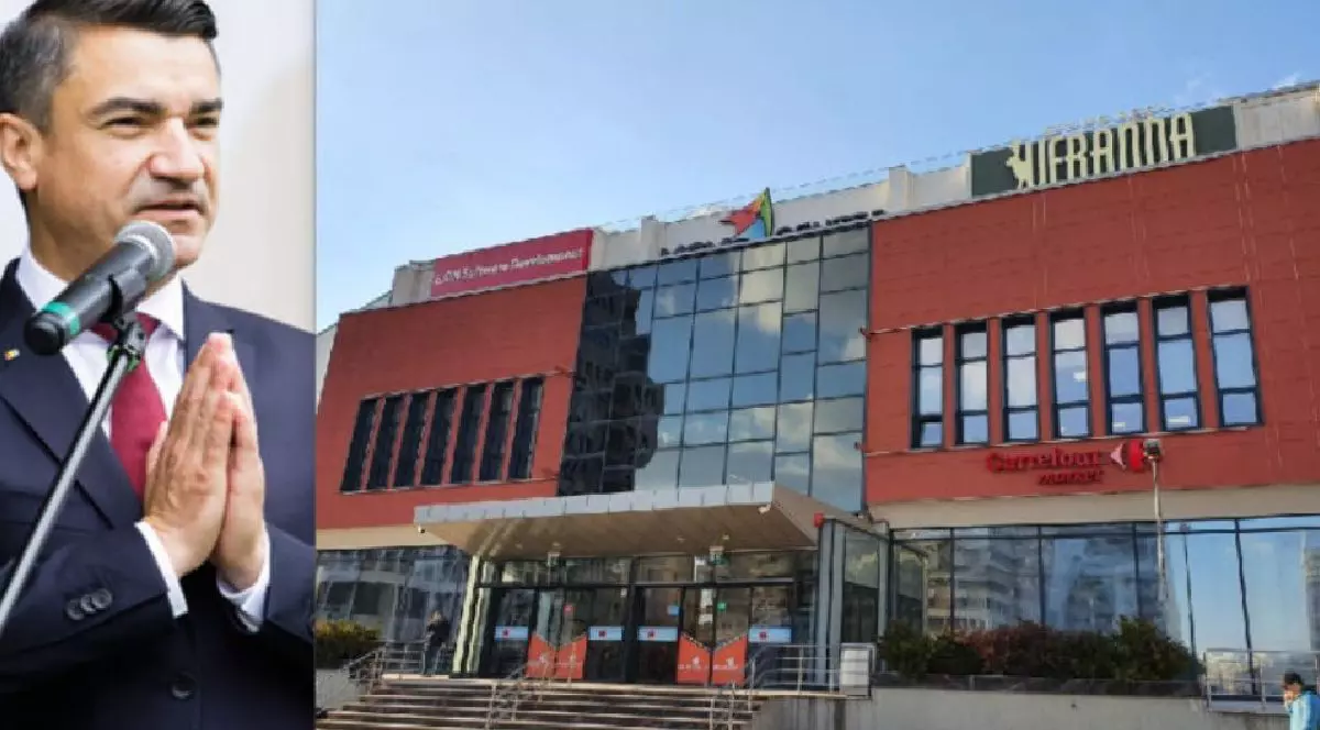 coloaj foto cu mihai chirica, primarul iasului, si mall-ul iesean veranda, o cladire moderna cu caramida rosie si sticla