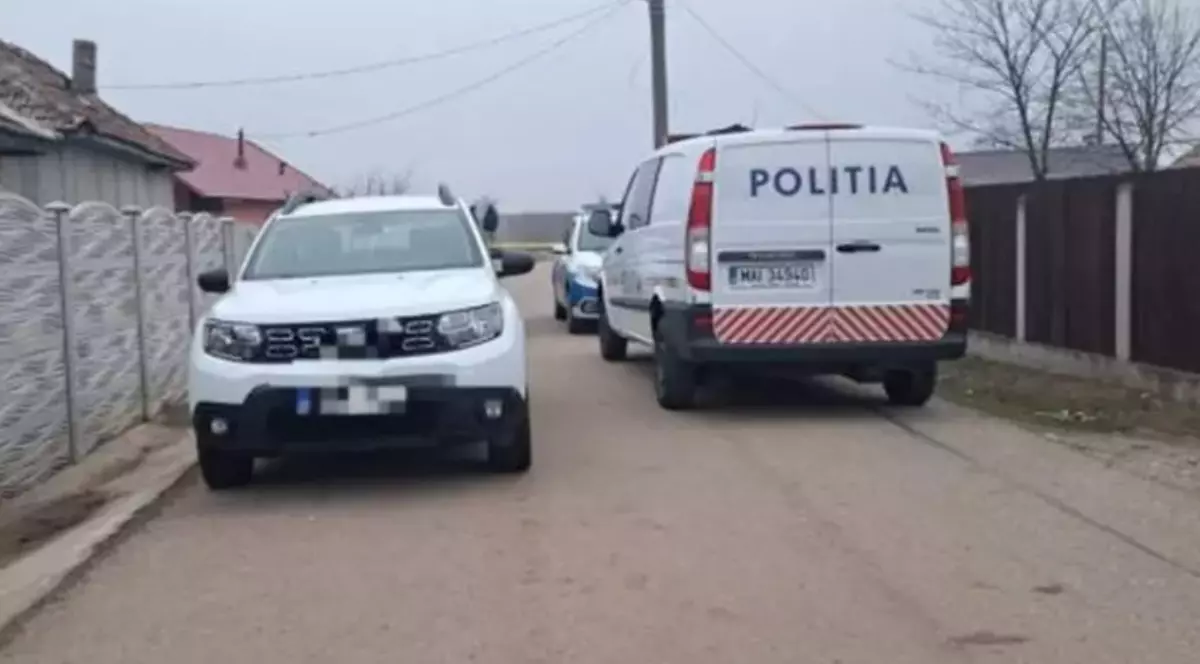 Mașini de poliție, parcate pe o stradă