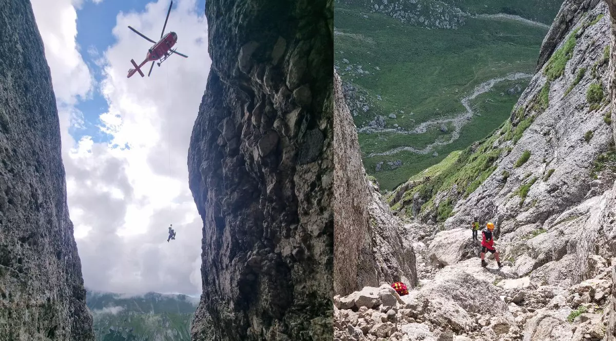 Un salvamontist coboară din elicopter/ Salvatori de la Salvamont Brașov pe munte