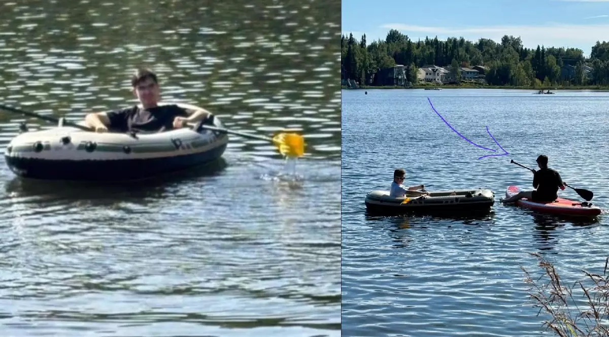 Un tânăr aflat pe un paddleboard, pe un lac din Alaska