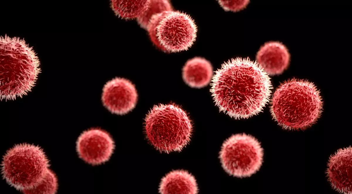 Imagine creativă cu un virus privit prin microscop, sub forma unor sfere de culoare roșie pe fundal negru