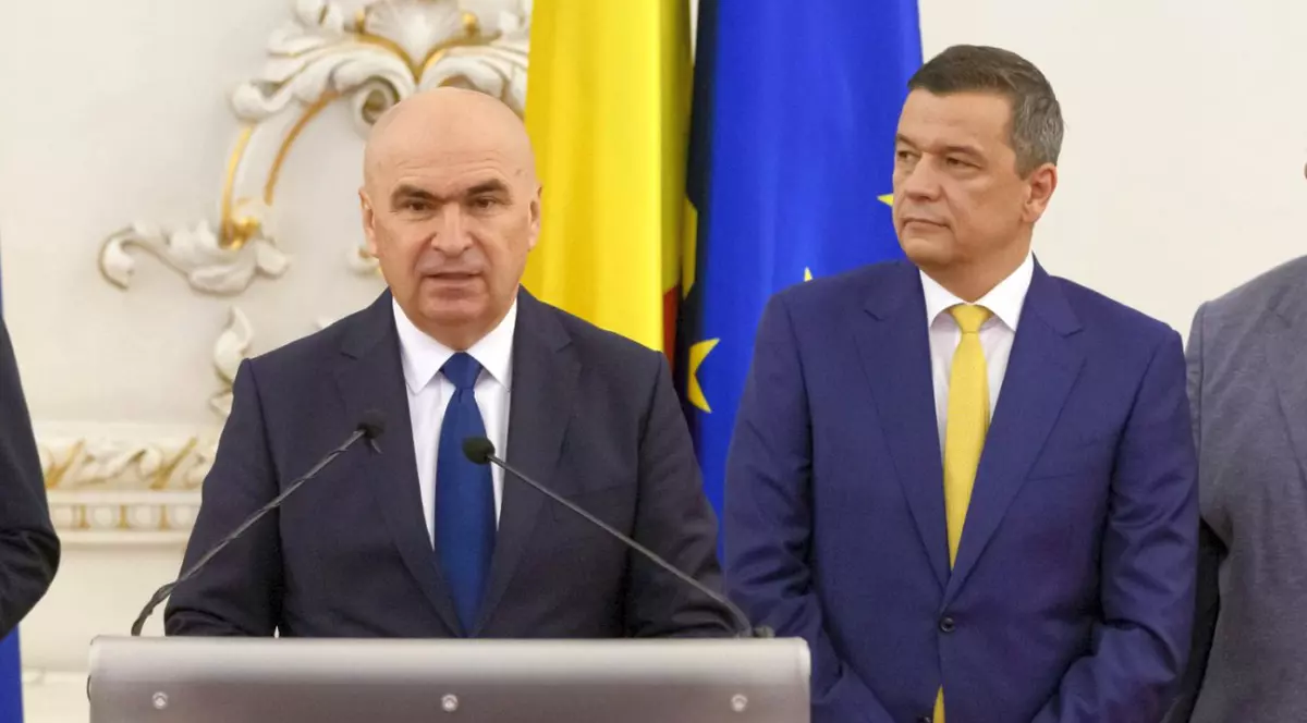 Ilie Bolojan (PNL) și Sorin Grindeanu (PSD) sunt parte din coaliție din luna iunie, dar se ceartă din iulie