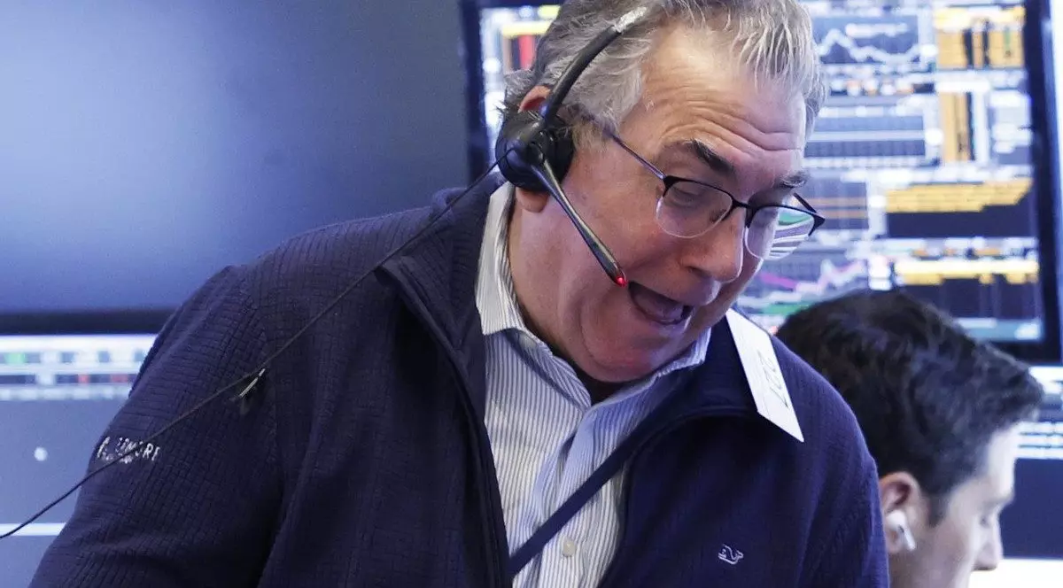 Acțiunile scad după noile tarife vamale impuse de China pe Wall Street, în New York. Foto Profimedia