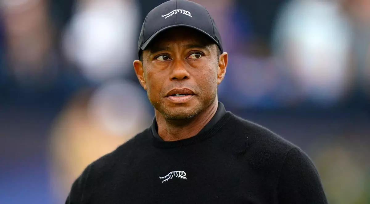 FILED - 17 July 2024, United Kingdom, Troon: US' Tiger Woods reacts after finishing his round on the 18th during a practice day ahead of The Open at Royal Troon. Woods has turned down the opportunity to captain the United States at the 2027 Ryder Cup, the PGA of America has announced. Photo: Zac Goodwin/PA Wire/dpa