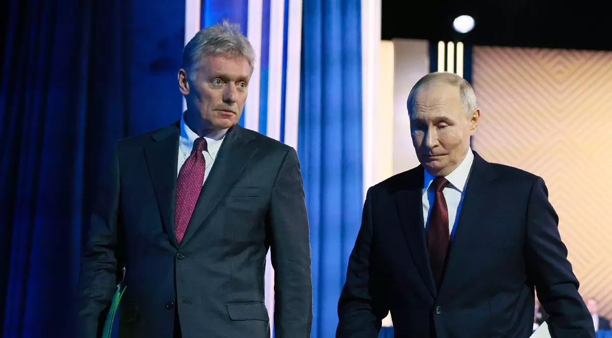 Dmitri Peskov și Vladimir Putin